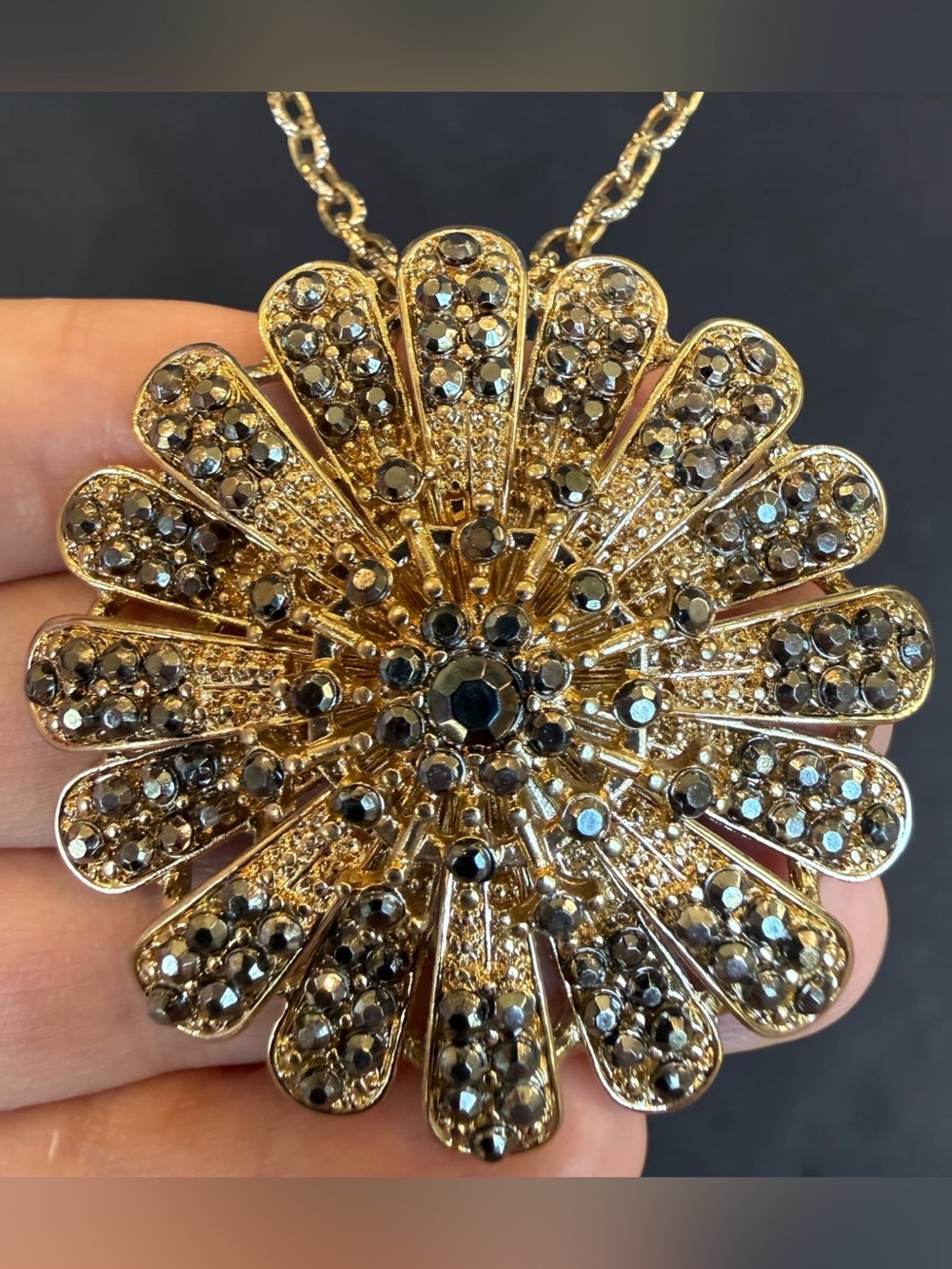 Vintage Gold Tone Sunburst Pendant Necklace Hematite Rhinestone Flower